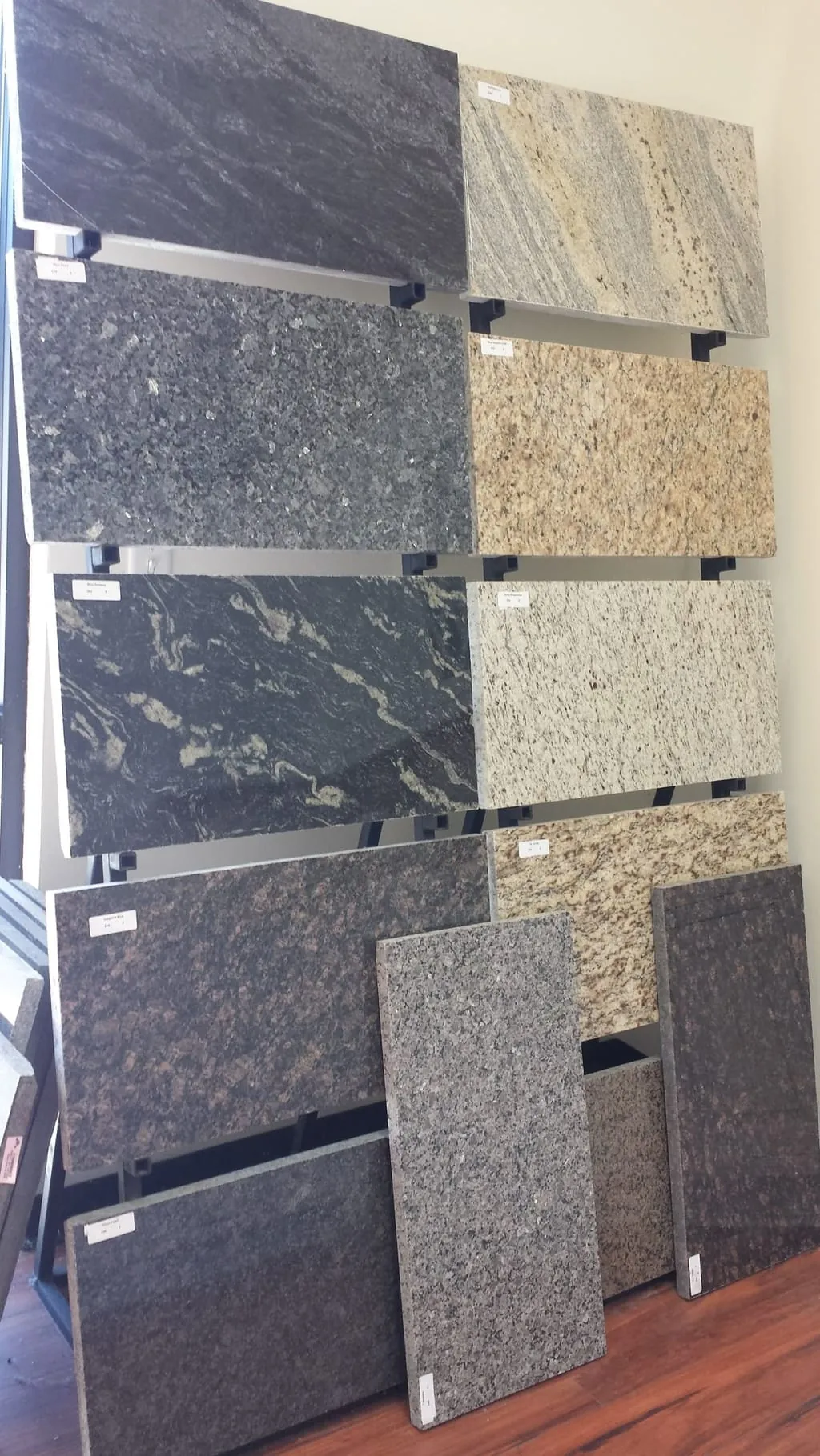 Granite slab sample in warm clay and dark tones