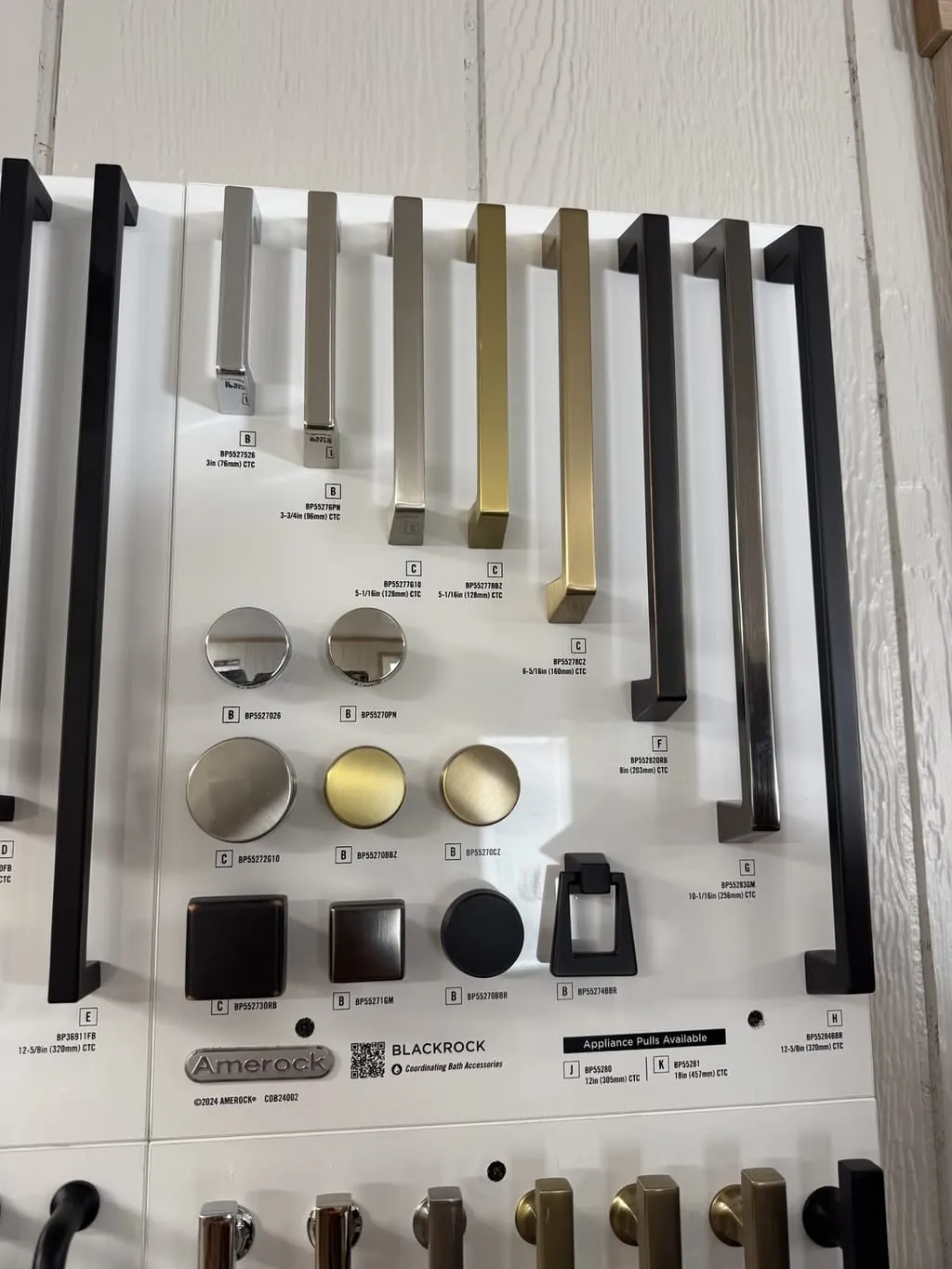 Shelves of pipes, fittings, timber and general hardware at the Al Rawa store